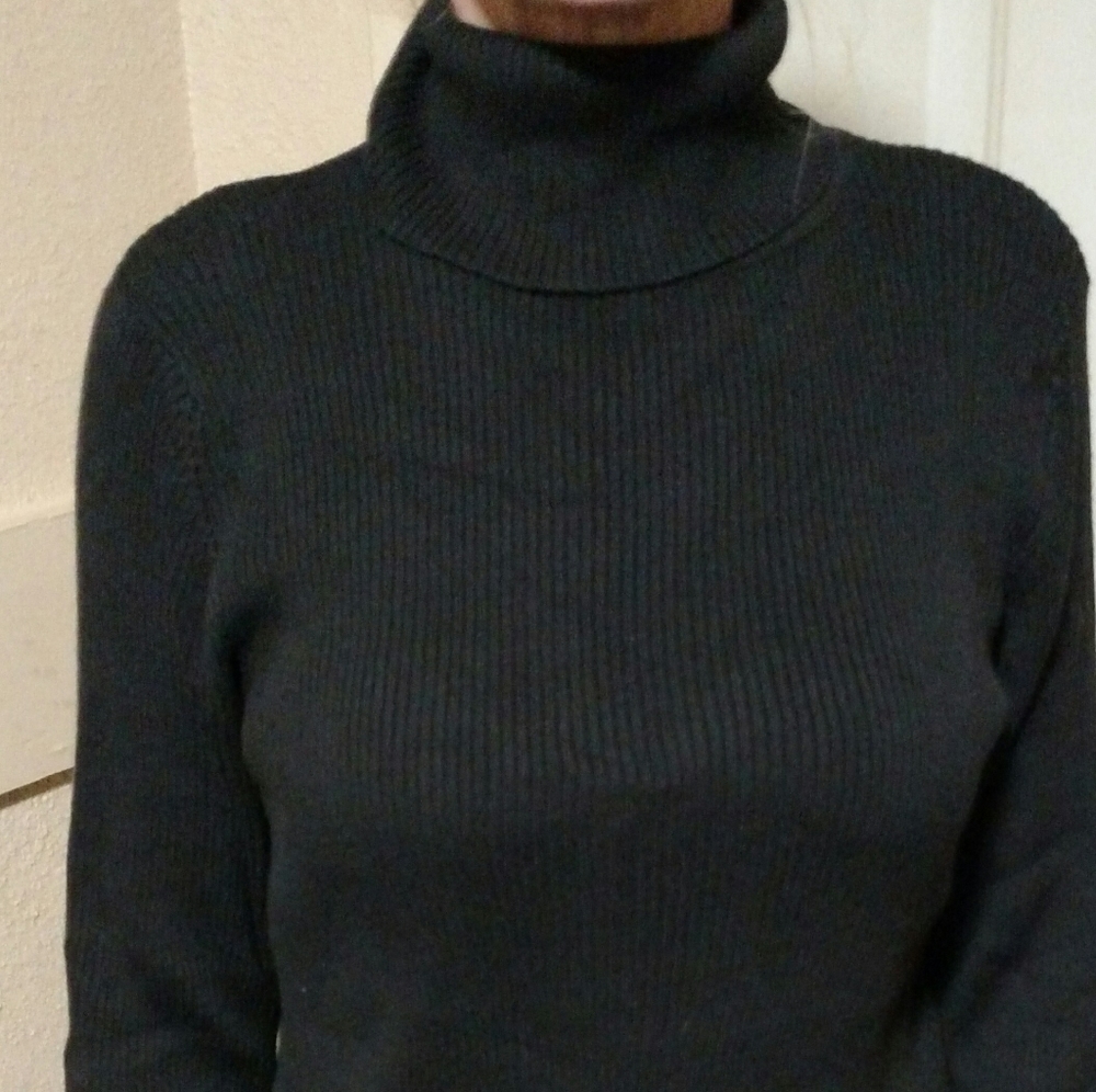 Kim Rogers black turtleneck
